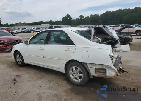 2002 Toyota Camry Le z USA, uszkodzony, nr VIN 4T1BE30K02U074197